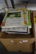 Box containing various books including craft and home interest