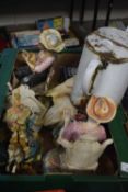 Box containing a quantity of various Capodimonte figures, vintage water can etc