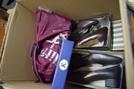Box containing a quantity of various vintage shoes