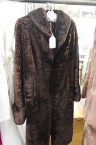 A lady's faux beaver weatherproof lambskin coat by Martins Glamar, together with a lady's
