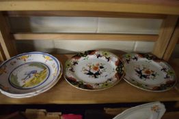 Two Royal Doulton gilt finish plates together with two French hand painted earthenware plates