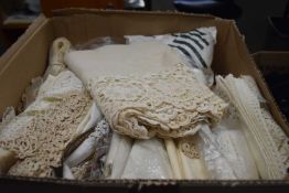 Box containing a large quantity of various linens and fabrics