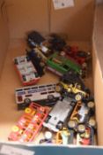 Box containing a small quantity of various die cast buses and cars