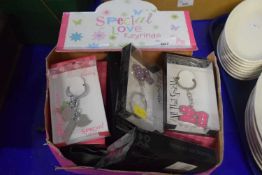 Box containing as new "Special Love" keyrings