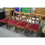 Set of four balloon back upholstered dining chairs