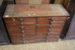 Fourteen drawer Victorian cabinet with turned knob handles, probably formerly part of a larger