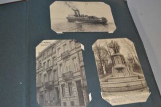 An album of various assorted postcards, mainly European buildings and views