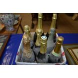 Box of various vintage bottles of Champagne