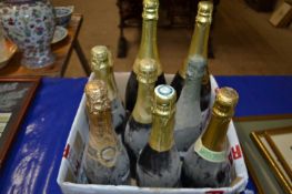 Box of various vintage bottles of Champagne