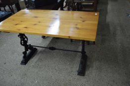 Cast base and pine top kitchen table, 127cm wide