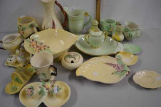 Collection of various Carlton ware, leaf formed table wares to include cruet, toast rack, various