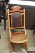 An early 20th Century rocking chair