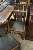 Set of four mesh back dining chairs