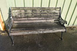 Iron and wood garden bench