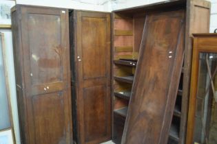 Two 19th Century mahogany single door cabinets, formerly part of a wardrobe together with a