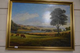 Cows Grazing by P R Streetly, oil on board in gilt frame