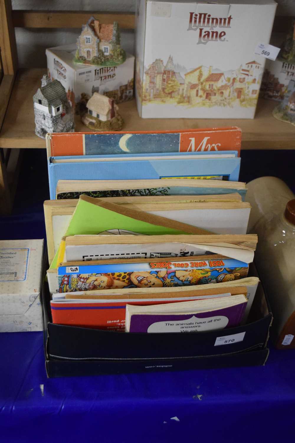 Box containing a quantity of various books including Giles, Garfield etc