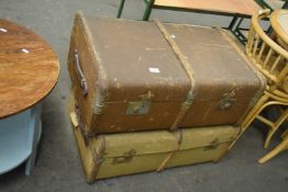Two wooden bound trunks