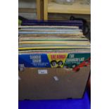 Box containing a quantity of various LP records including Foreigner, Shirley Bassey, Herb Alpert,