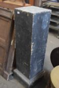 A black painted wooden column
