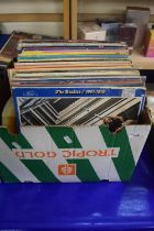 Box containing a quantity of 33rpm LP records including The Beatles, The Carpenters, Cliff