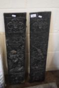 A pair of cast iron moulded decorative panels