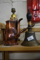 Copper chocolate pot together with a hand bell and lamp base