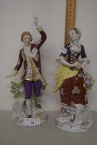 A pair of modern Sitzendorf porcelain figures depicting a gallant and a lady