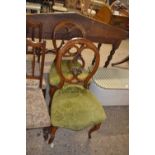 Pair of late Victorian balloon back dining chairs with green upholstered seats