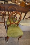 Pair of late Victorian balloon back dining chairs with green upholstered seats
