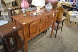 An American oak three door side cabinet, 107cm wide