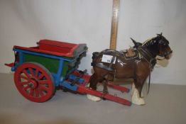 A Beswick carthorse model together with a painted wooden cart (2)