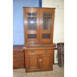 Late Victorian oak side cabinet with glazed top section over a base with drawers and cupboards