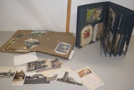 Two albums of various early 20th Century postcards