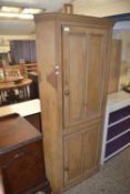19th Century stained pine floor standing corner cabinet with painted interior