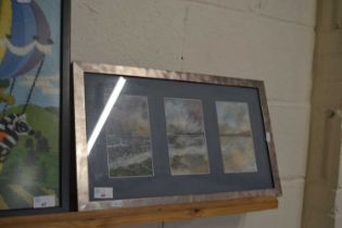 Framed triple picture of a coastal scene