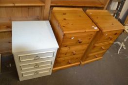 Two pine three drawer bedside cabinets and another (3)