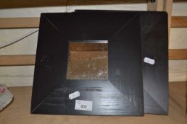 Three black framed square wall mirrors, each approx 26cm square