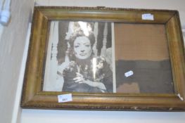A framed photograph of a Hollywood movie star in gilt frame