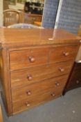 A mahogany chest of drawers of two short and three long