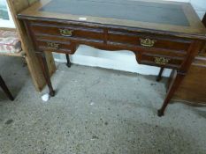 Late Victorian American walnut four drawer writing table, 106cm wide