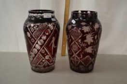 Two 20th Century Bohemian red and clear glass vases of slightly differing designs