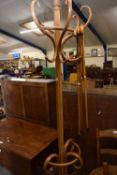 Bentwood coat stand and three various walking sticks
