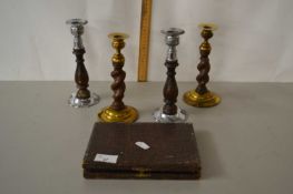 Mixed Lot: Two pairs of candlesticks and a cased set of butter knives