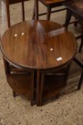 Nest of four mahogany occasional tables