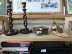 Pair of barley twist candlesticks, carved wooden box and a further wall hanging figure