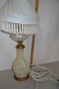 Table lamp with opaque glass base