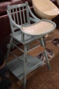 A blue painted child's highchair