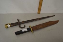 A rifle bayonet together with a further dagger (2)