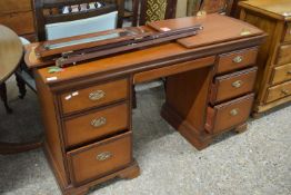 A Stag twin pedestal dressing table with triple mirror